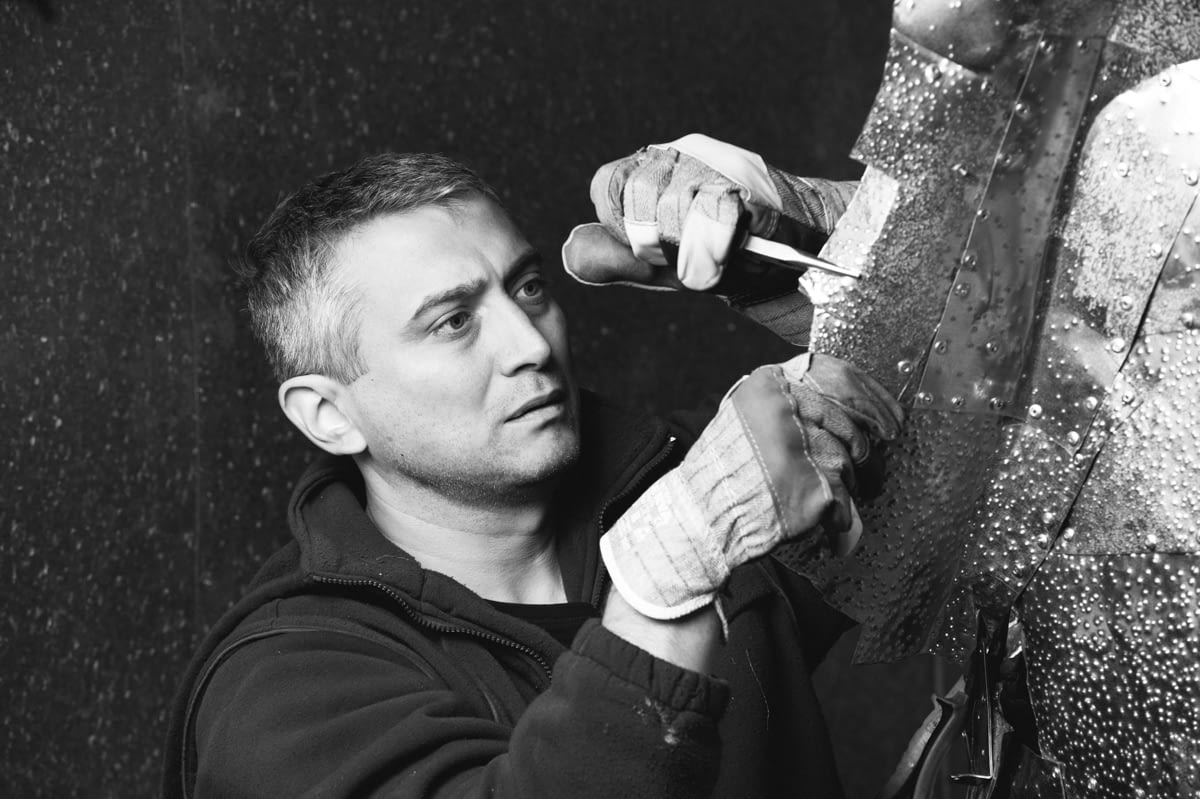 Alexandru Radvan painter sculptor in his art studio photographed by Ciprian Andrei