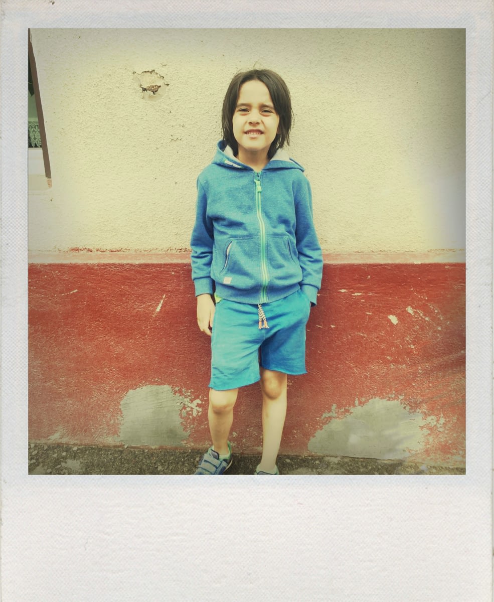 Polaroid photography Tudor kid by Ciprian Andrei