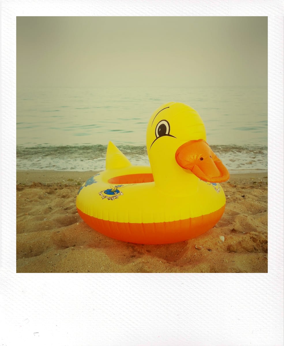 Polaroid photography swimming toy by Ciprian Andrei